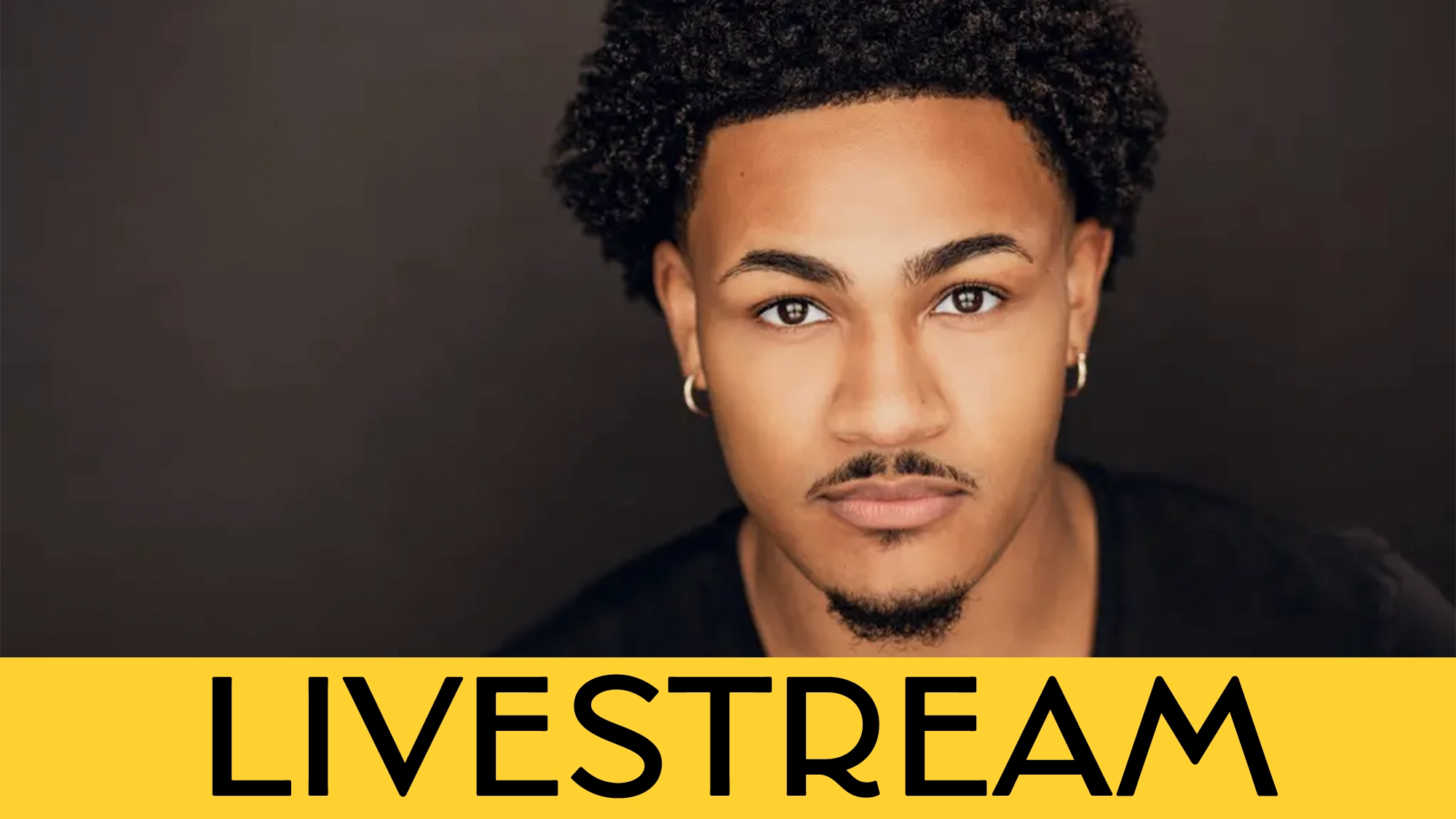 A young man with short, curly hair, trimmed beard, and gold hoop earrings looks directly at the camera. He wears a black shirt. The background is dark, and a bold yellow banner at the bottom displays the word 