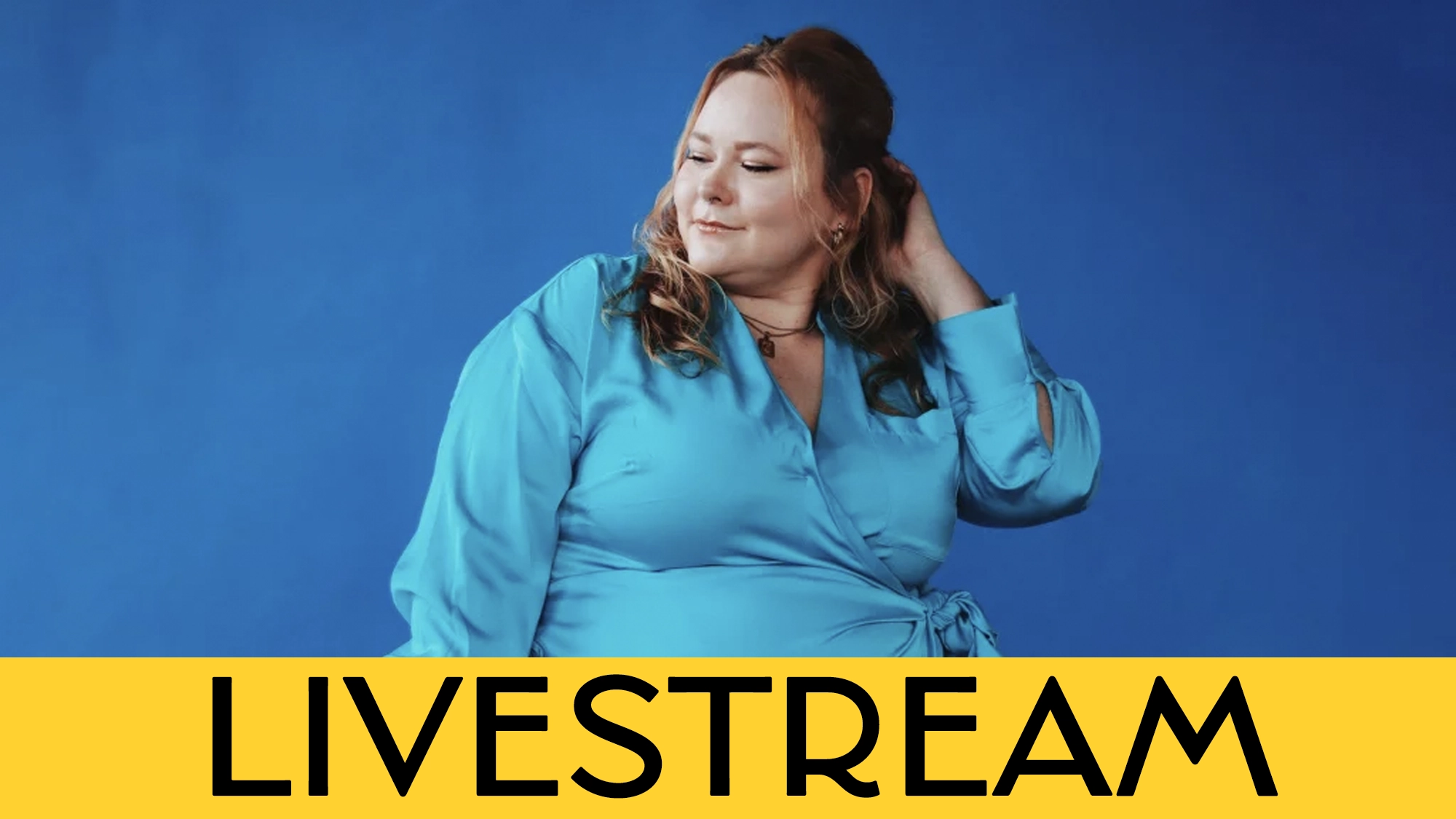 A woman in a bright blue wrap dress poses against a solid blue background, looking to the side with one hand touching her hair. Across the bottom, a yellow banner features the bold black text “LIVESTREAM.”.