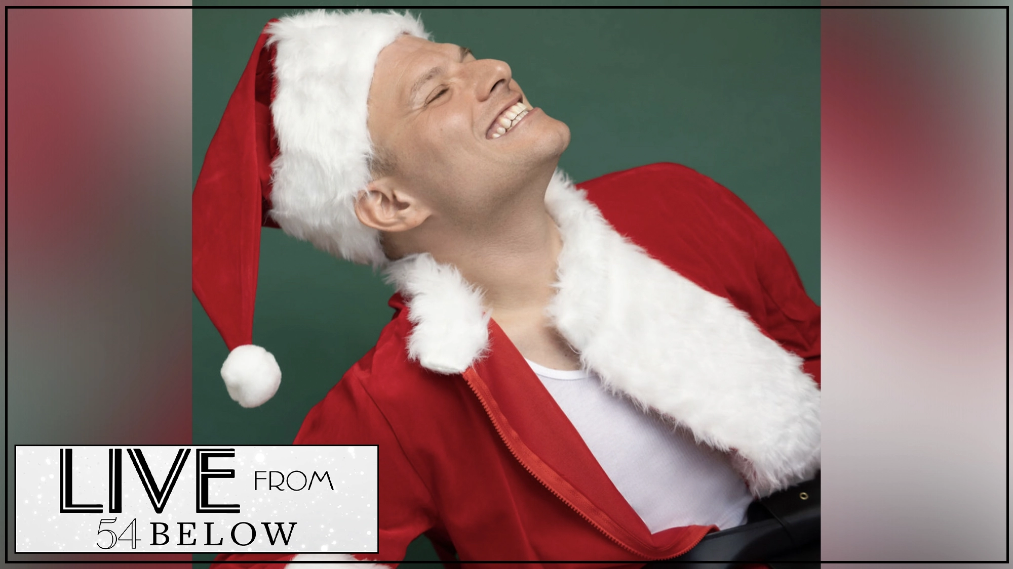A person wearing a red Santa hat and suit with white trim leans back, smiling joyfully against a green background. In the bottom left corner, a white text box reads “LIVE FROM 54 BELOW: Night After Christmas LIVESTREAM with Robert Bannon.”.