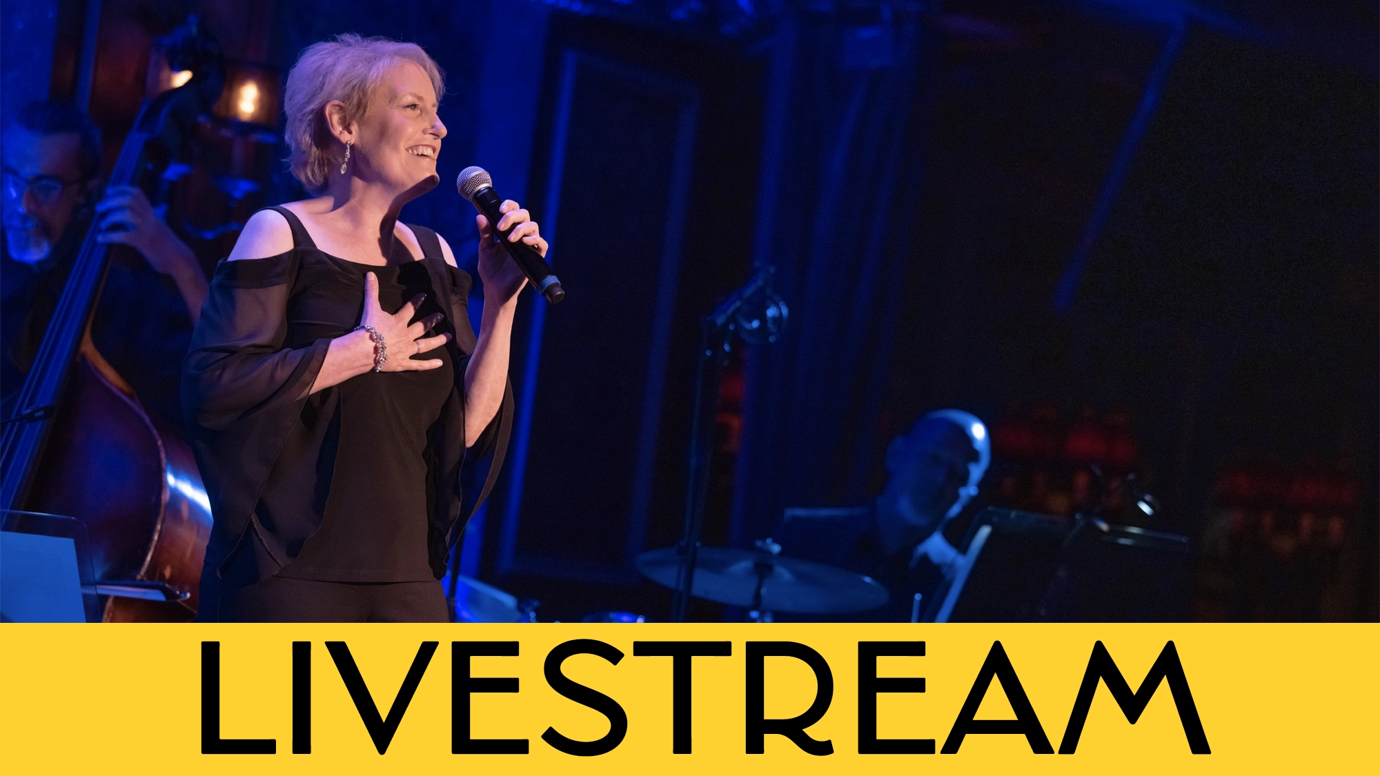 A woman with short blonde hair, Liz Callaway, sings Sondheim into a microphone on stage in a black dress. A bassist and drummer play behind her amid blue and purple lights. A bold yellow banner at the bottom reads 
