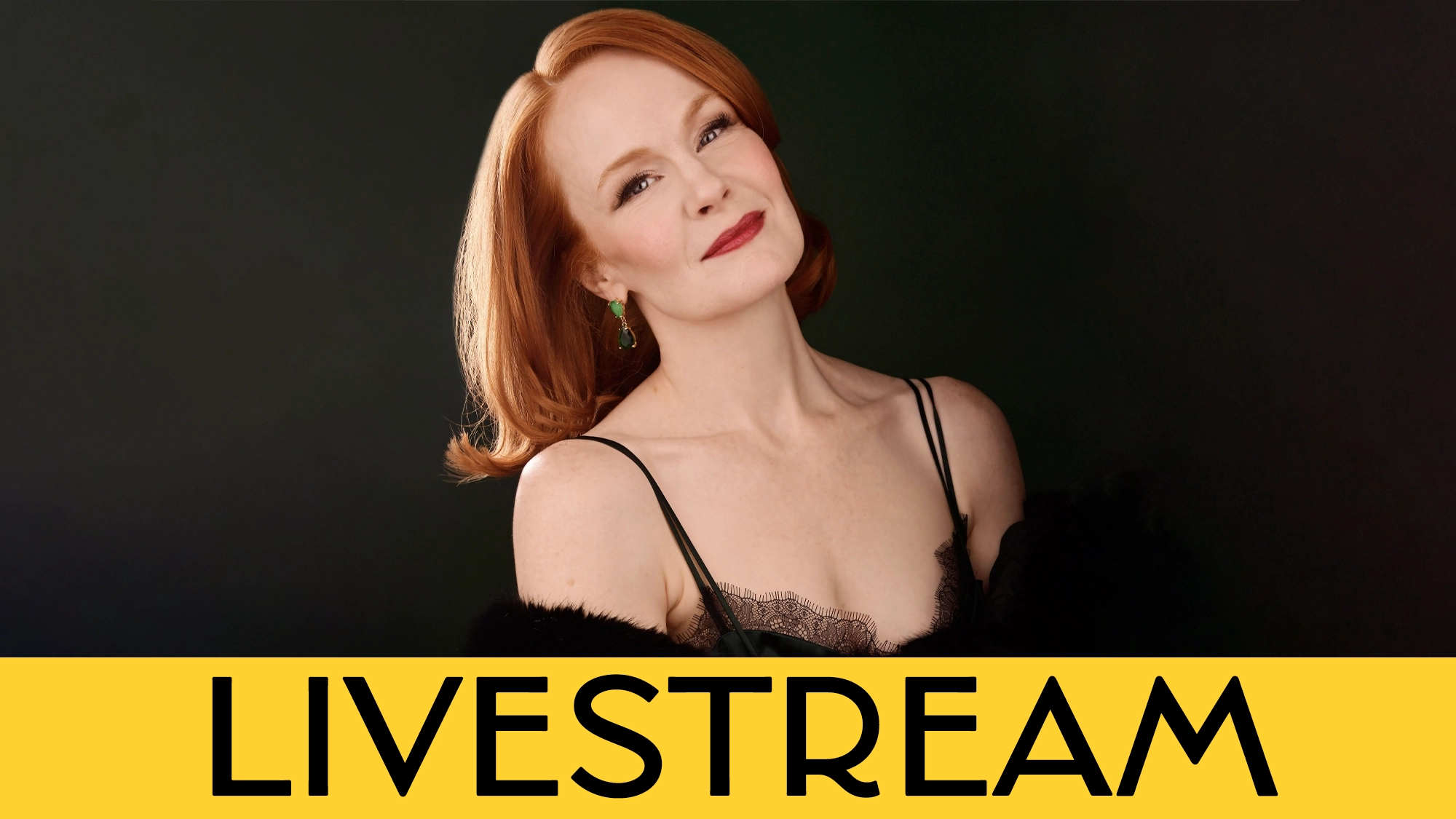 A woman with red hair in soft waves—Kate Baldwin—wears a black lace camisole and green earrings, smiling slightly against a dark background. A bold yellow banner at the bottom displays 