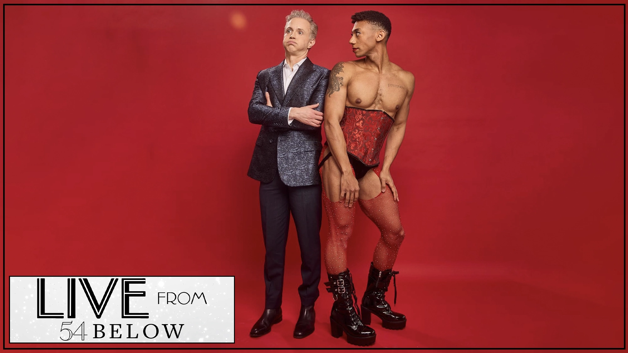 LIVE Broadway Undressed Two people stand in front of a bright red background. One wears a sparkly suit with arms crossed, looking serious. The other poses confidently in a red corset, fishnets, and platform boots. A “Live from 54 Below” logo appears in the bottom left corner, highlighting the bold energy of Broadway Undressed—where Tom Guthrie brings theatrical flair to The Door between classic style and.