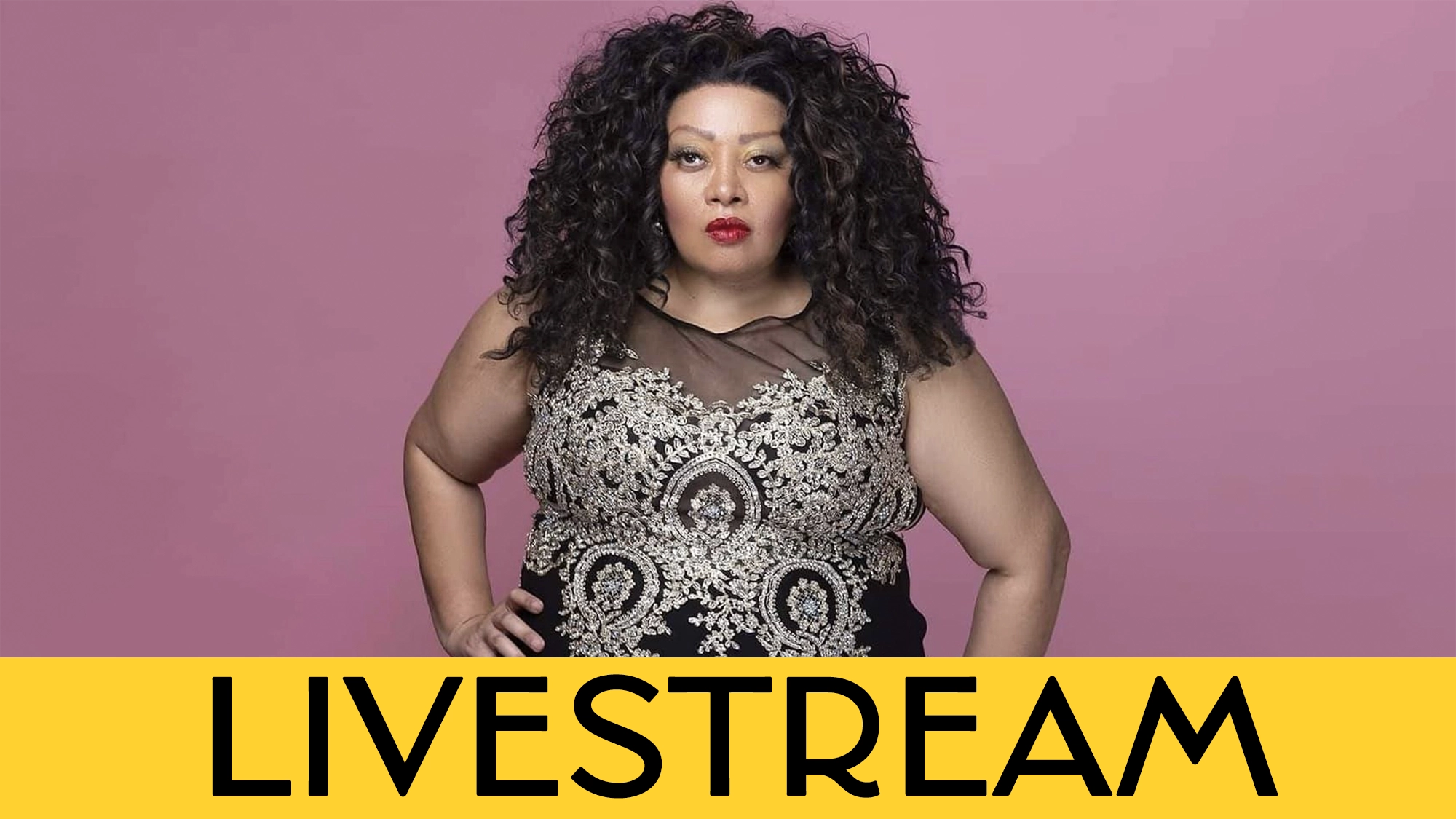 A woman with long, curly black hair and bright red lipstick stands confidently against a pink background, wearing a black and gold embroidered dress. A yellow banner at the bottom reads “LIVESTREAM” in large black letters.